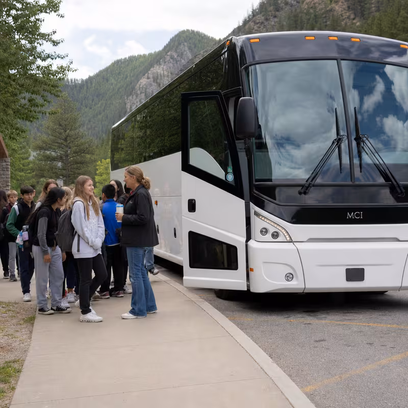Black Mercedes Sprinter van staged for an Freemont School Transportation group
