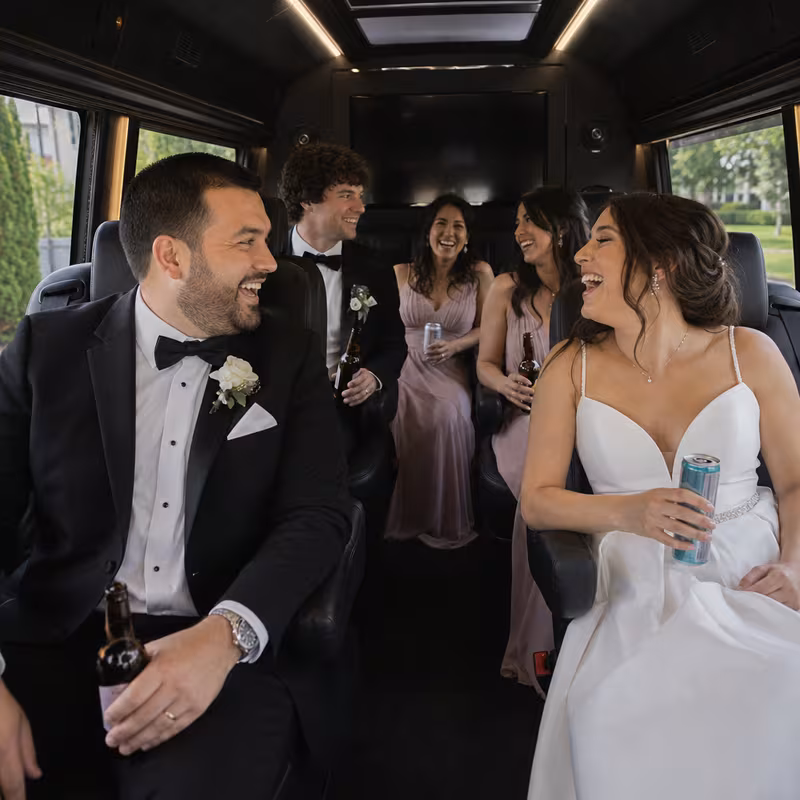 Black Mercedes Sprinter van staged for an Freemont Wedding Transportation group